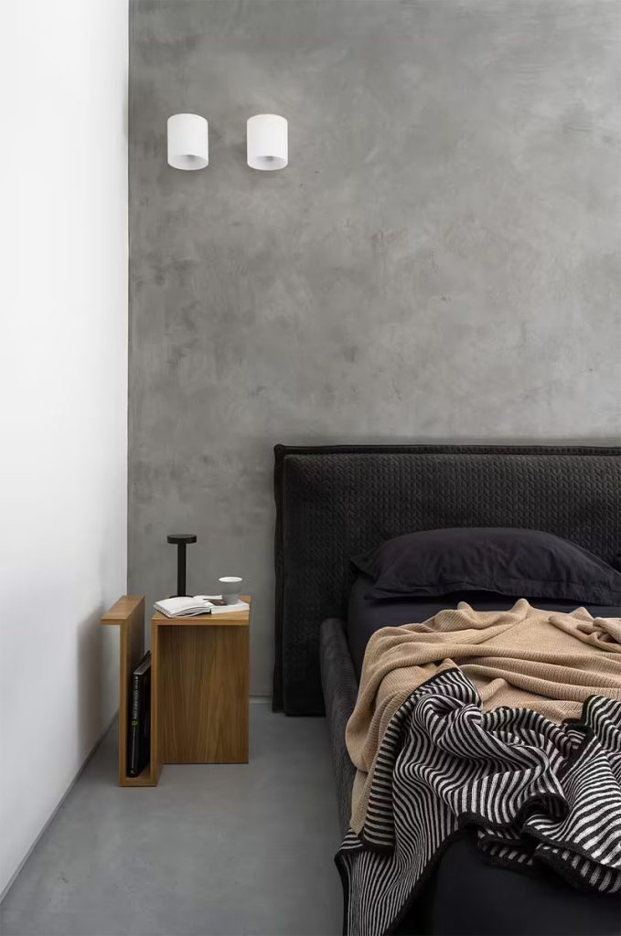 betonlook muur slaapkamer