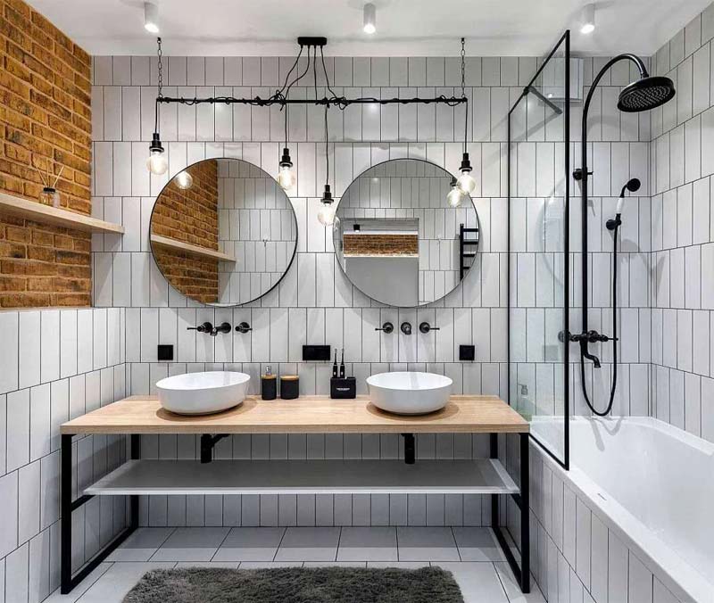 Ontwerper Denys Bondarenko bewijst met dit ontwerp dat een dubbele wastel in een kleine badkamer ook heel goed mogelijk is.