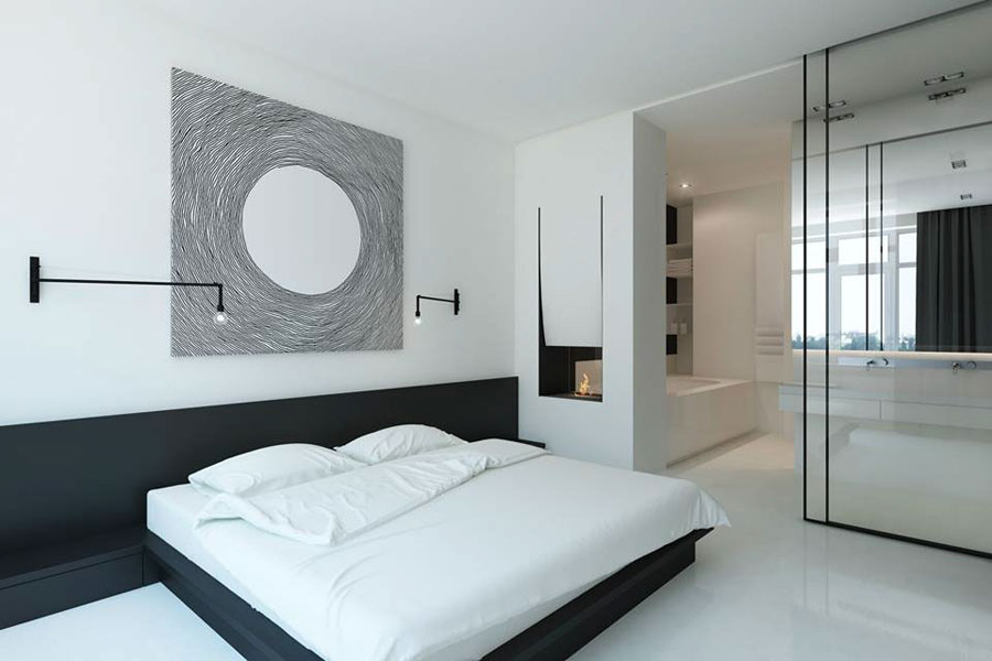 In deze strakke moderne minimalistische slaapkamer is een elektrische sfeerhaard geplaatst tussen de slaapkamer en de badkamer. Klik hier voor meer foto's.