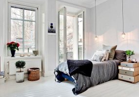 Slaapkamer houten vloer wit schilderen