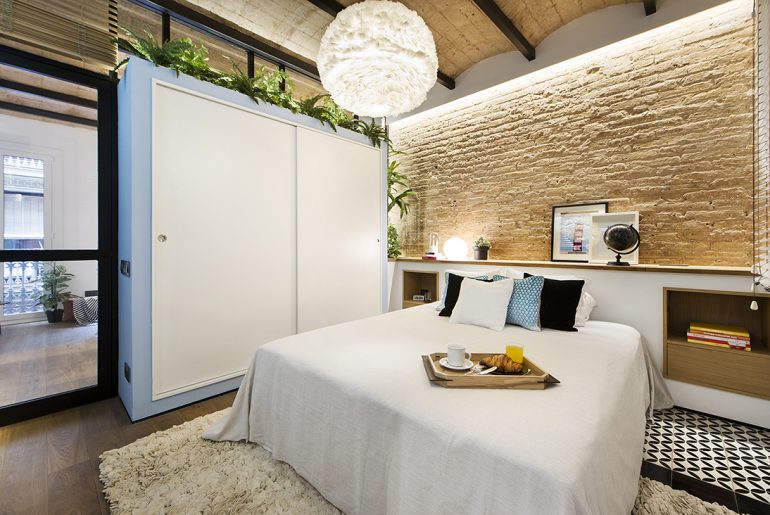 Slaapkamer in een stoer en stijlvol strand thema