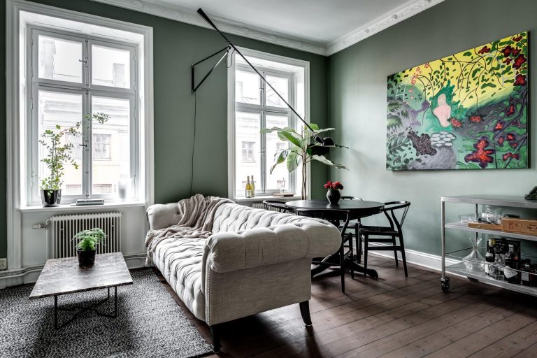 woonkamer ideeen multifunctionele wandlamp - Flos 265 wandlamp bij bank en eettafel